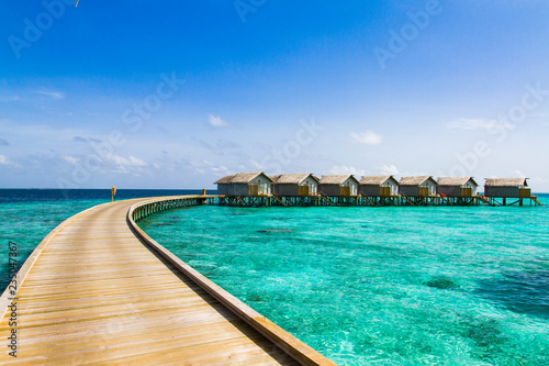 Beautiful tropical Maldives resort hotel and island with beach and sea on sky for holiday vacation background concept