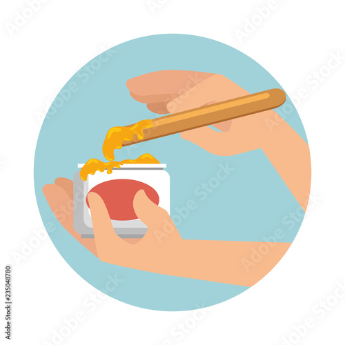 hand using depilatory wax pot with applicator