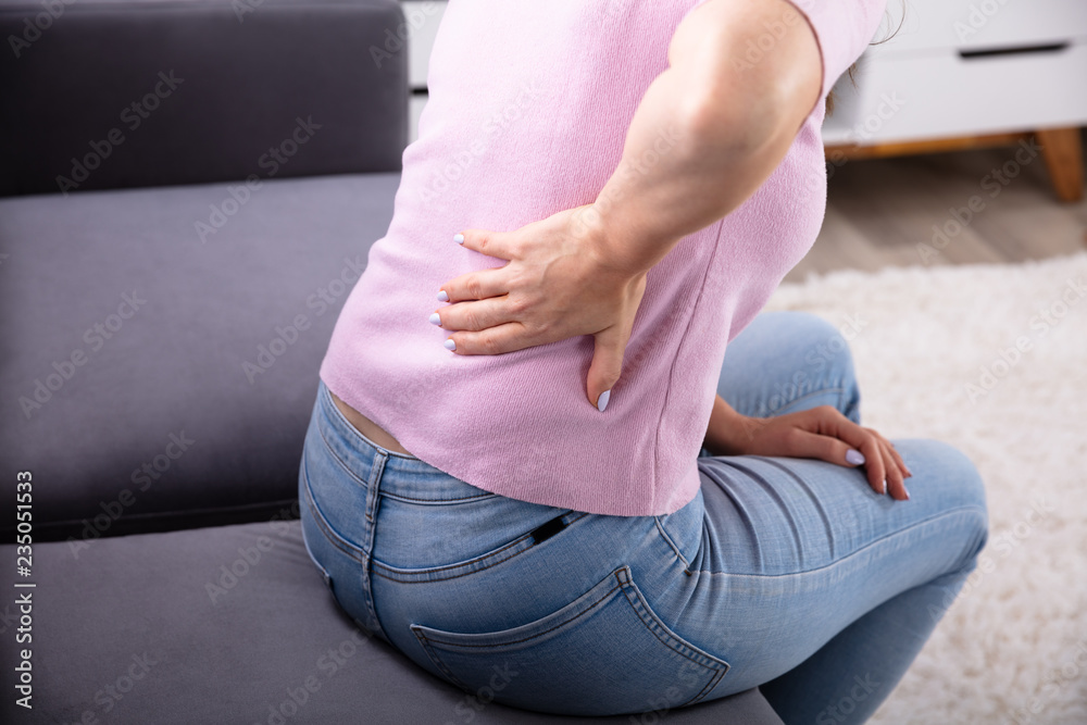 Close-up Of A Woman Having Back Pain