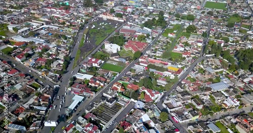 Top drone view of downtown the charming town of chalco Mexico, and view of the downtown and roads towards Mexico City. photo