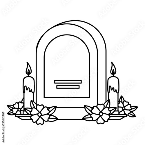 tombstone with flowers and candles