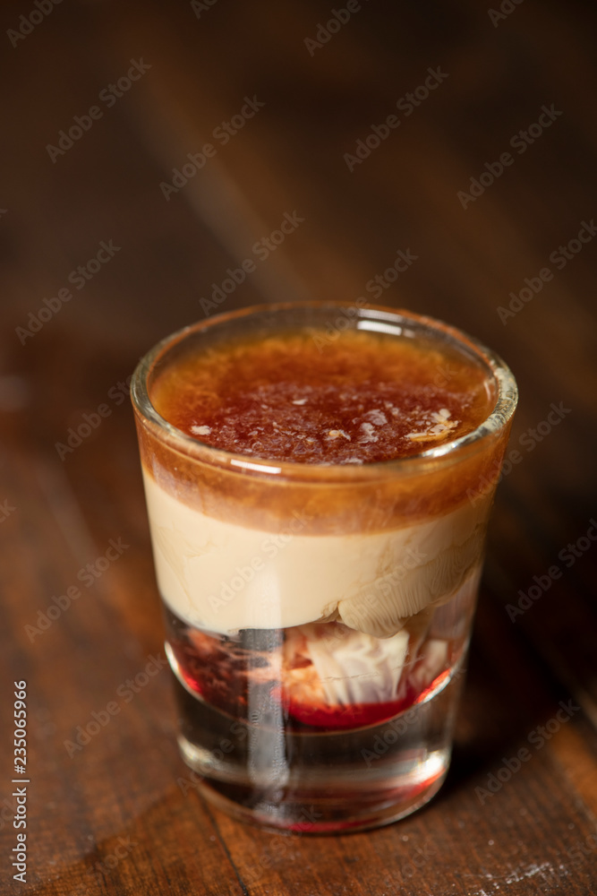 Brain Hemorrhage shot cocktail with schnapps, baileys irish cream and grenadine Brain Hemorrhage shot cocktail with schnapps, baileys irish cream and grenadine