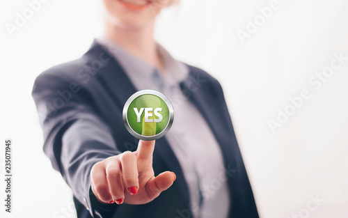 Business woman presses the screen with her finger 