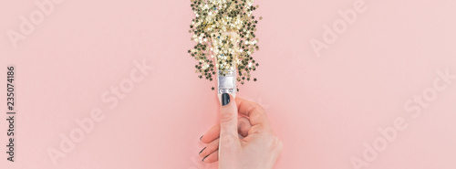 Fotografija Surreal Paint brush drawing golden stars confetti