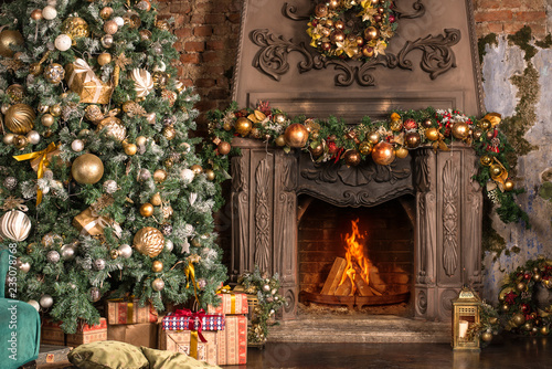 Christmas room, fireplace with fire and Christmas tree with decorations