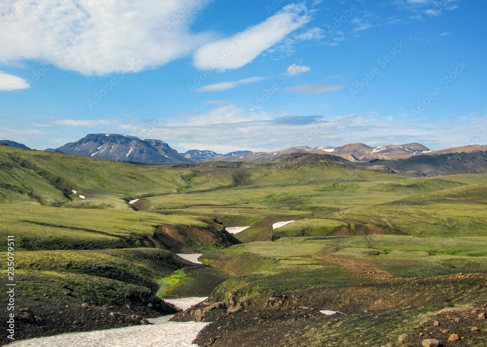 Naklejka premium Beautiful landscape of green Hvanngil valley and rhyolite mountains covered with snow, Laugavegur Trail, Highlands of Iceland