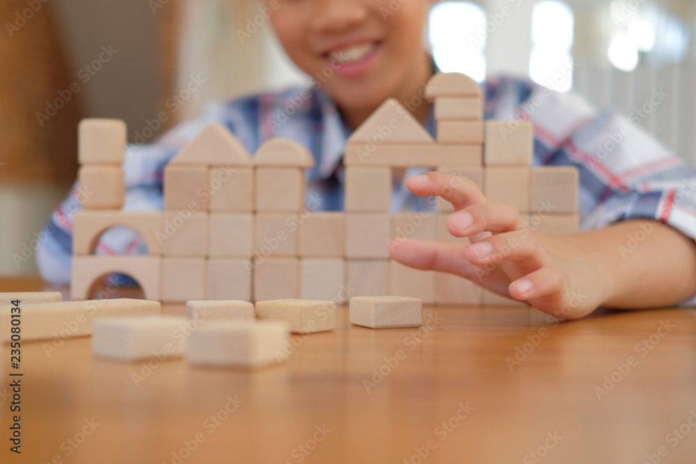 little asian kid boy child children schoolboy playing wood block toy. learning education concept little asian kid boy child children schoolboy playing wood block toy. learning education concept
