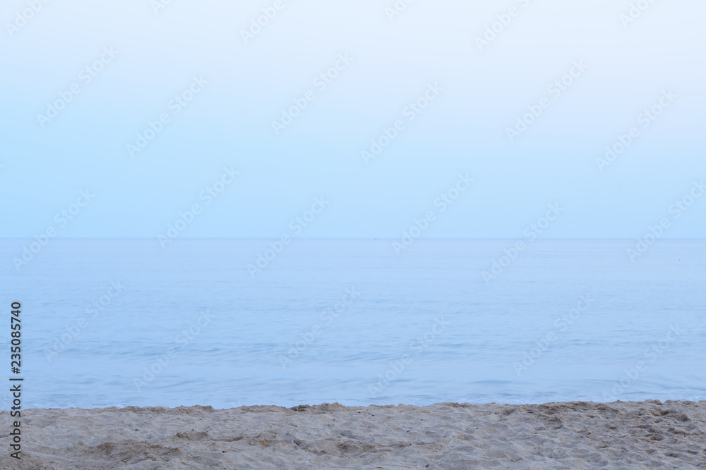 Peaceful View Of The Sea At The Beach Against Clear Blue Sky Peaceful View Of The Sea At The Beach Against Clear Blue Sky