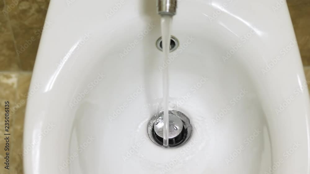 Top view of white ceramic bidet in bathroom Top view of white ceramic bidet in bathroom