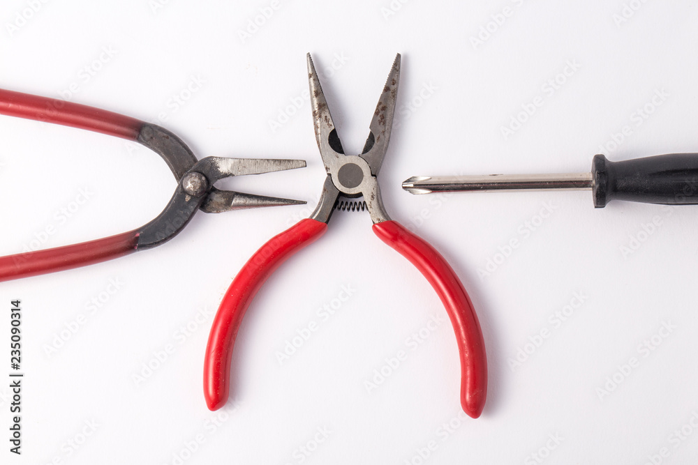 Tools for repair. Pliers and screwdriver Tools for repair. Pliers and screwdriver