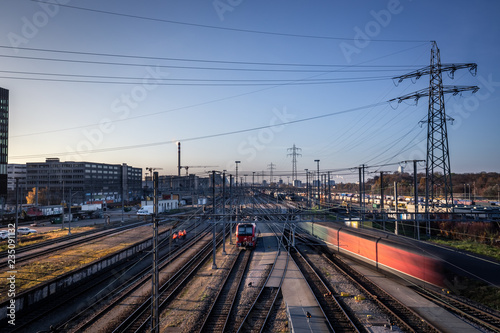 Industrial city railway tracks and moving trains