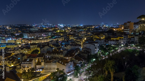 Lisbon aerial panorama view of city centre with illuminated building at Autumn night timelapse, Portugal