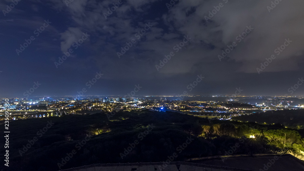 Naklejka premium Panoramic View over Lisbon and Almada from a viewpoint in Monsanto timelapse.