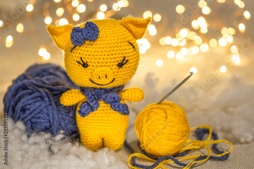 Amigurumi. Knitted yellow pig. Symbol of the year 2019. Handmade toy