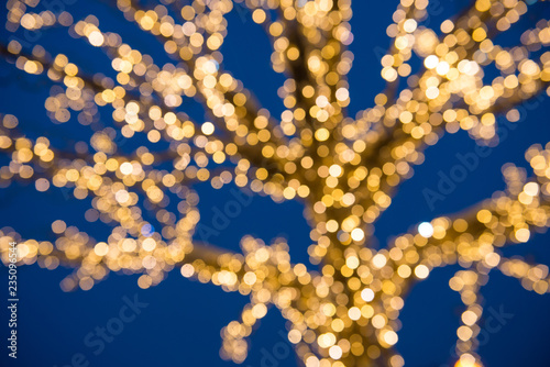 Blurred golden lights Christmas Tree
