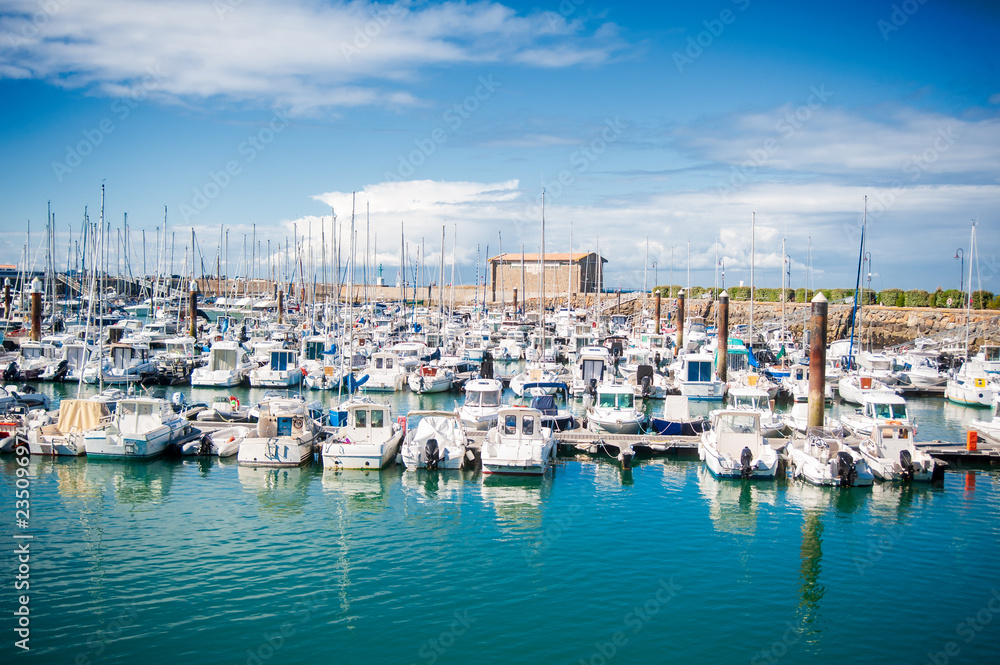 view on the harbour of Herbaudière on the isle of Noirmoutier at summertime with a lot of boats