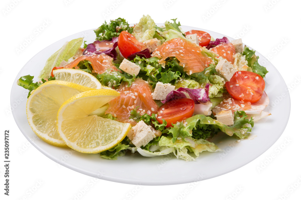 vegetable salad with tofu and salmon, lettuce and cherry tomatoes, decorated with a slice of lemon, on a plate, on a white background, isolate vegetable salad with tofu and salmon, lettuce and cherry tomatoes, decorated with a slice of lemon, on a plate, on a white background, isolate