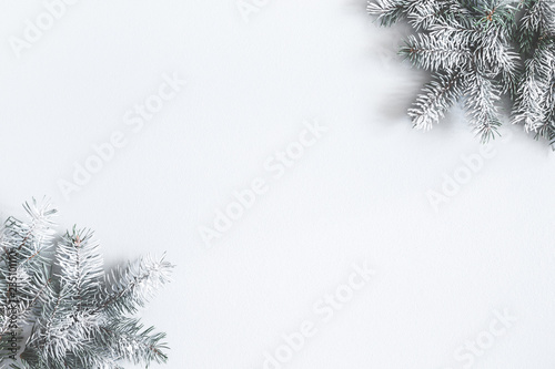 Christmas composition. Frame made of fir tree branches on pastel gray background. Christmas  winter  new year concept. Flat lay  top view  copy space