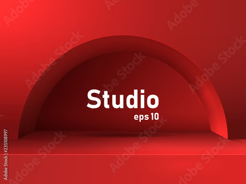 Empty red studio table with arch and recess. Free space for product presentation.