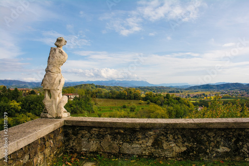 The autumn landscape in the Collio vineyard area of Friuli Venezia Giulia, north west Italy, showing a statue from the historic Abbazia di Rosazzo Abbey
 photo