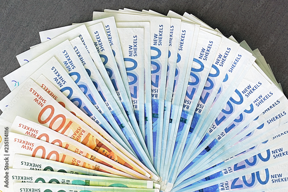 Fan of New Israeli Shekel series C. Israeli money notes background. Textures. Close-up Fan of New Israeli Shekel series C. Israeli money notes background. Textures. Close-up