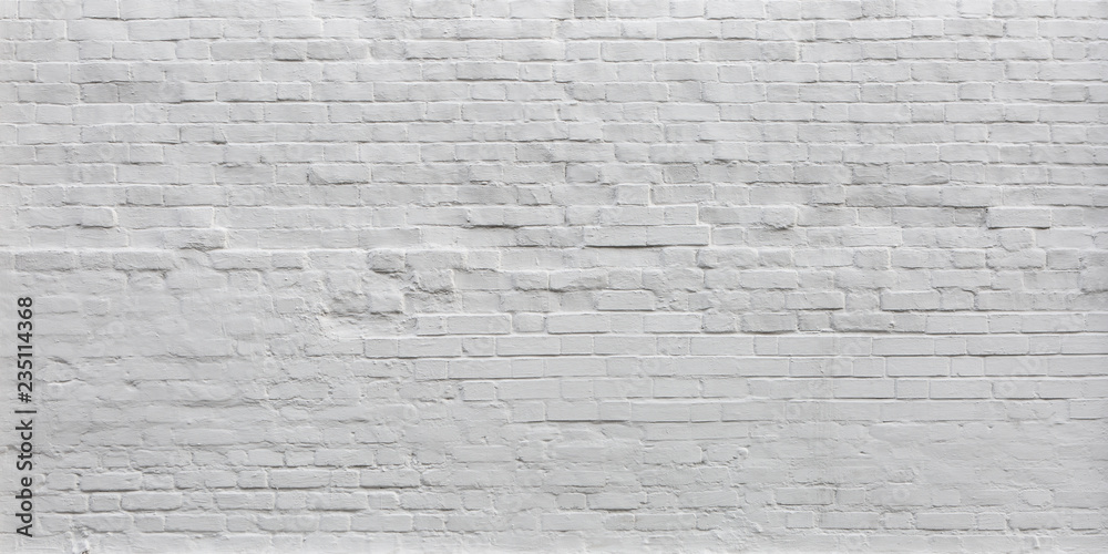 White Rustic Texture. Retro Whitewashed Old Brick Wall Surface. Vintage Structure. Grungy Shabby Uneven Painted Plaster. Whiten Facade Background. Design Element. Abstract Light White Web Banner.