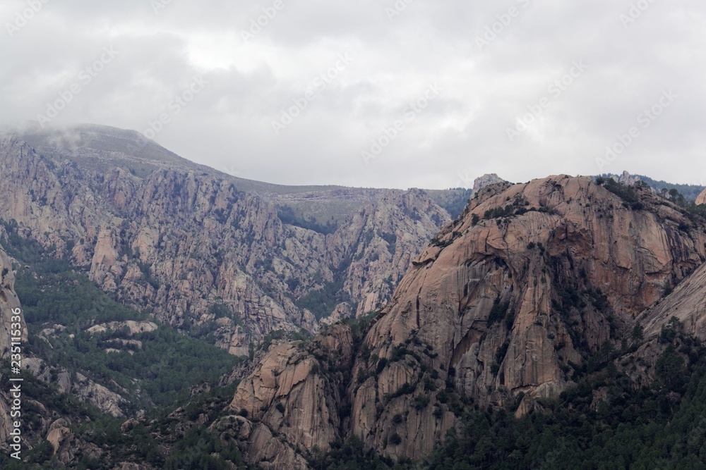 Mountains with clouds in the Bavella region in Southern Corsica.