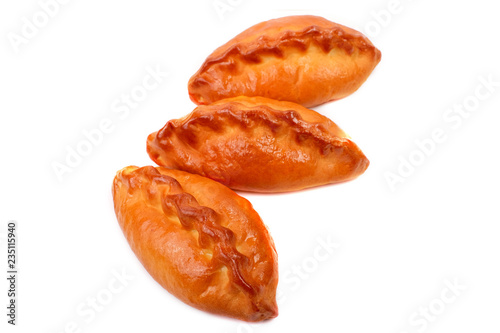 Traditional Russian baked pies pirozhki. Isolated over white background