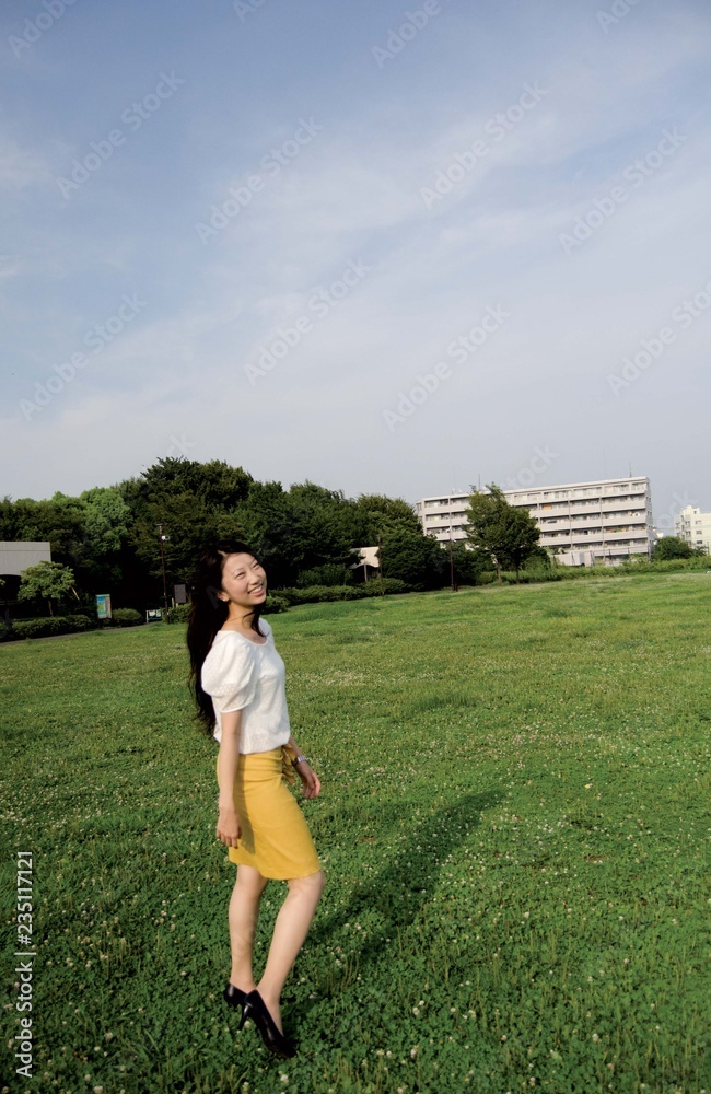 Asian female model poses for pictures in the nature