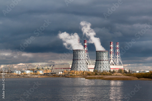 working heat power plant against the dark sky photo