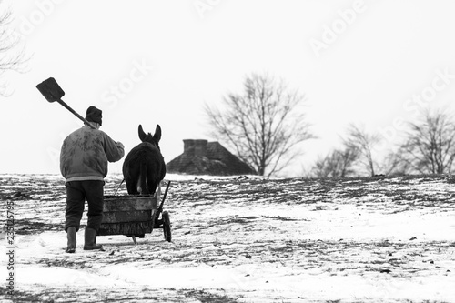 Farmer working on cold winter day