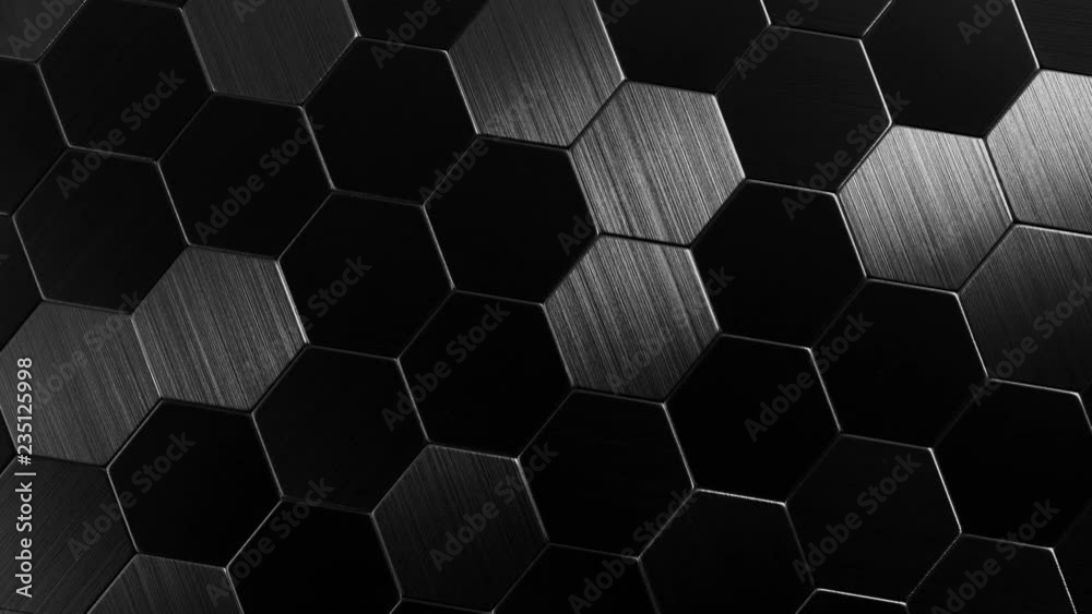 Hexagons metal surface rotates around the center of a shot. Seamless looping.