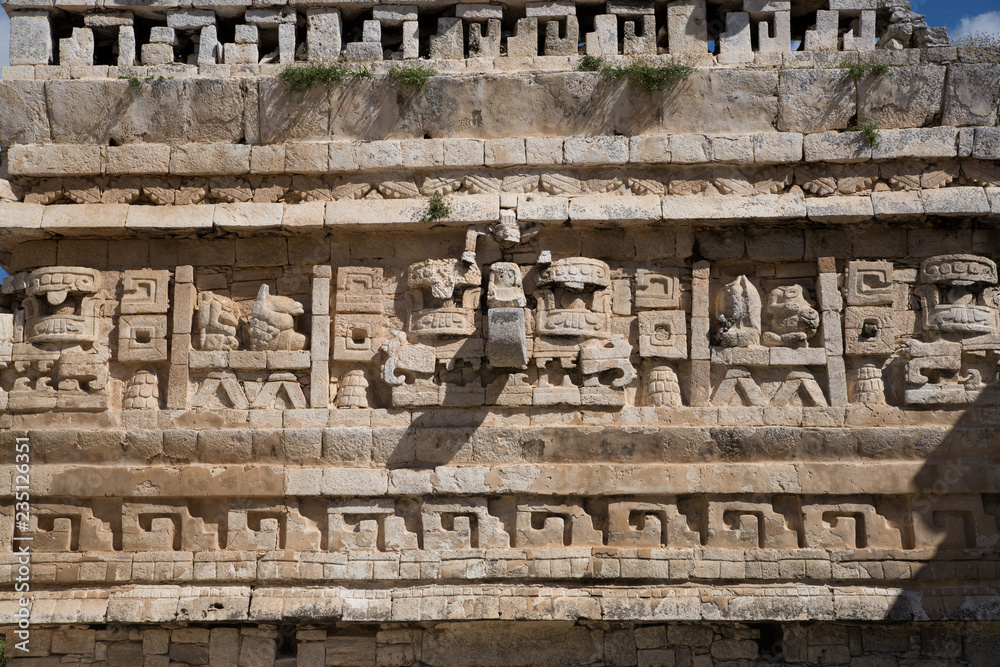 Mexico, Yucatán - February 15, 2018: Mexico, Chichen Itza.Detail of decorative band of temple. Ruins of the private yard, possibly belonged to the royal family