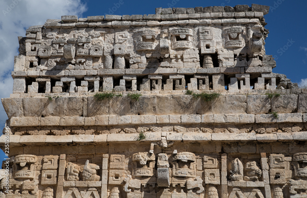 Mexico, Yucatán - February 15, 2018: Mexico, Chichen Itza.Detail of decorative band of temple. Ruins of the private yard, possibly belonged to the royal family