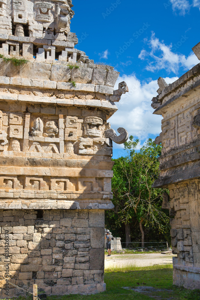 Mexico, Yucatán - February 15, 2018: Mexico, Chichen Itza.Detail of decorative band of temple. Ruins of the private yard, possibly belonged to the royal family Mexico, Yucatán - February 15, 2018: Mexico, Chichen Itza.Detail of decorative band of temple. Ruins of the private yard, possibly belonged to the royal family