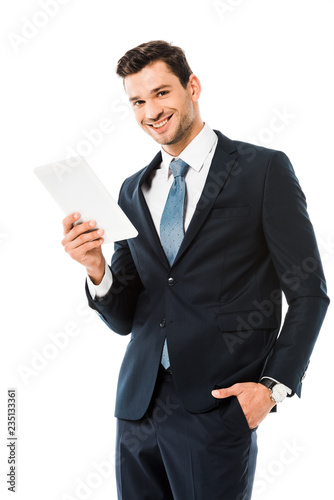 adult handsome cheerful businessman holding digital tablet isolated on white