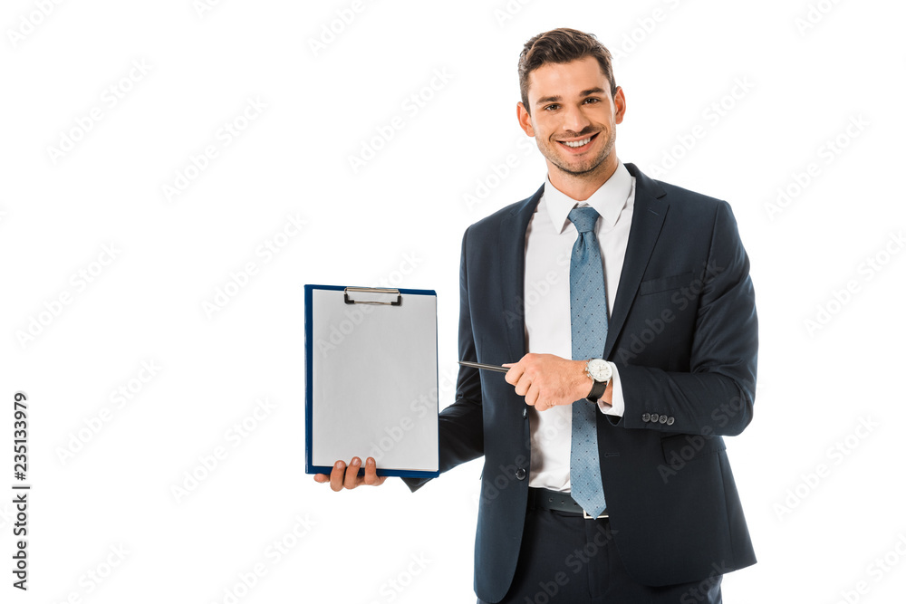 smiling businessman in suit pointing at empty clipboard isolated on white smiling businessman in suit pointing at empty clipboard isolated on white