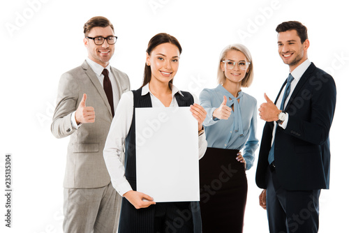 female boss holding empty placard while professional team showing thumbs up isolated on white