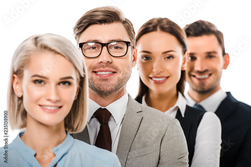 smiling business group looking at camera isolated on white