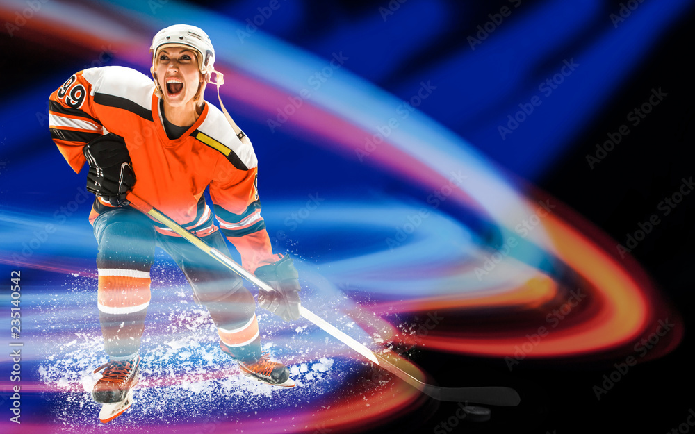 The female hockey player in uniform posing with helmets off in front of