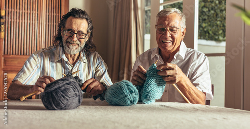 Photography Retired men doing pastime at home knitting