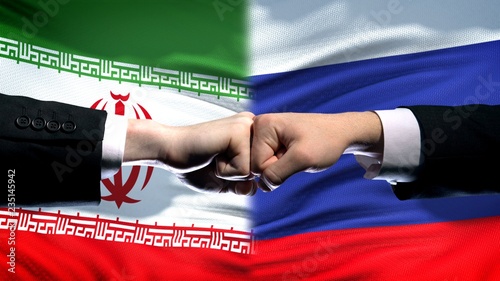 Konstfotografi Iran vs Russia conflict, international relations, fists on flag background