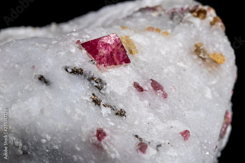 Macro mineral stone Spinel on a black background