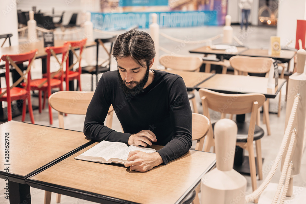 Modern man reads a book Modern man reads a book