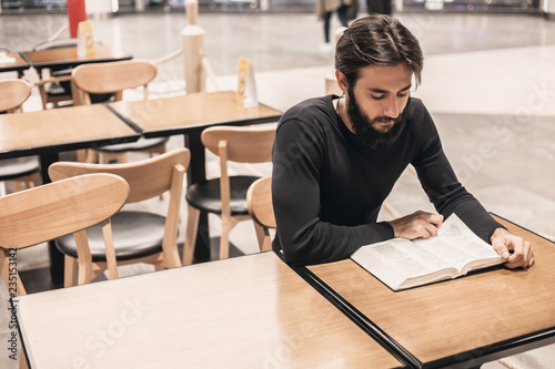 Modern man reads a book