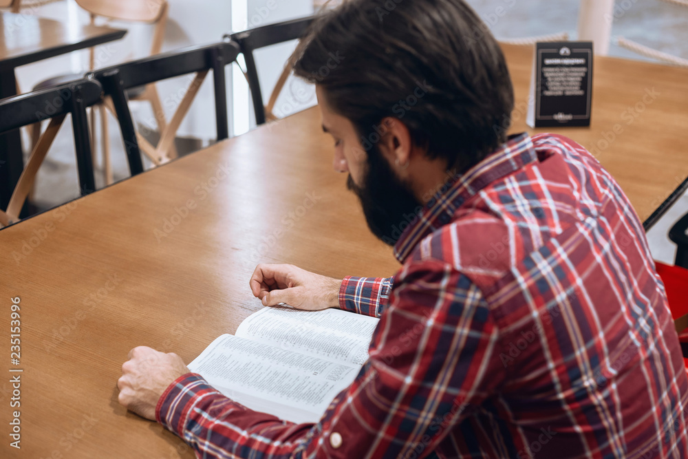 Modern man reads a book Modern man reads a book