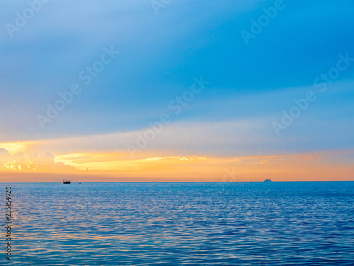 Seascape view under twilight evening sky