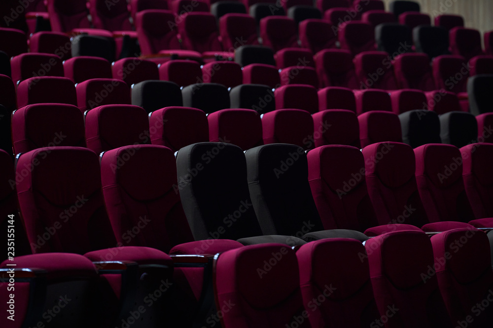 empty red chairs in theaters empty red chairs in theaters
