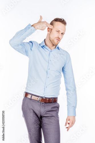 Man on a white studio background.. emotions and people concept.