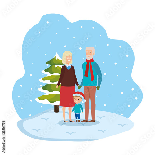 grandparents couple with grandson in snowscape